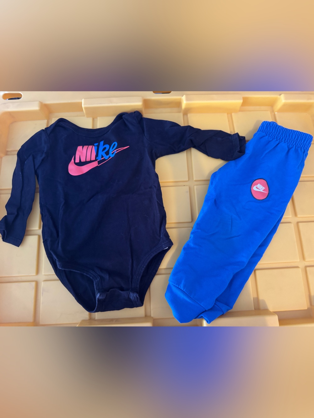 Nike Navy Top with Bright Blue Jogger Pants and Pink Logo